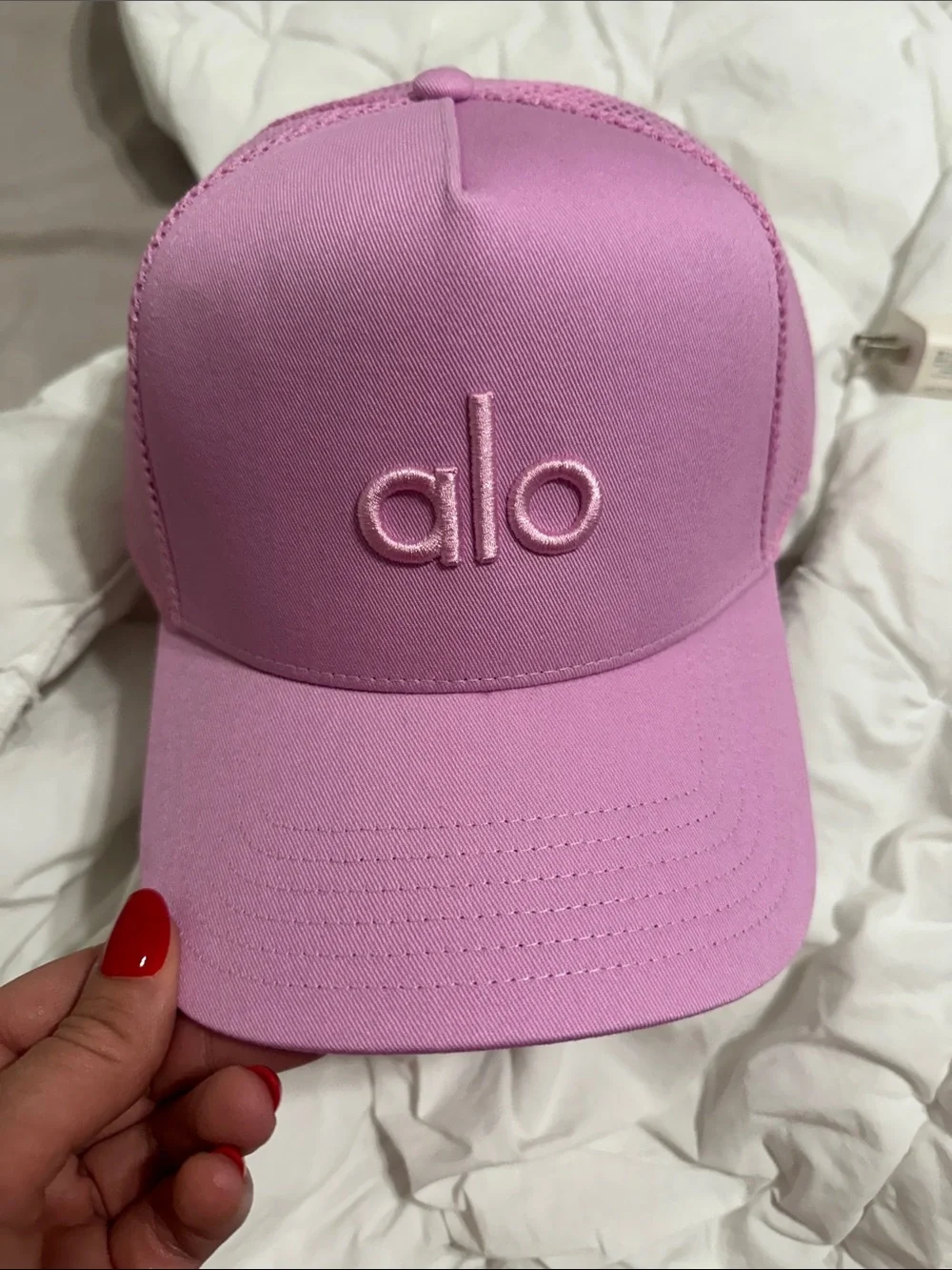 Alo pink trucker hat